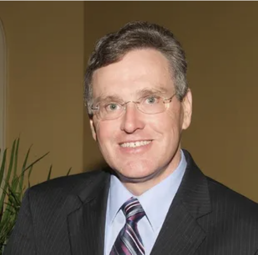 Professional portrait of Florida attorney Dennis S. Moses